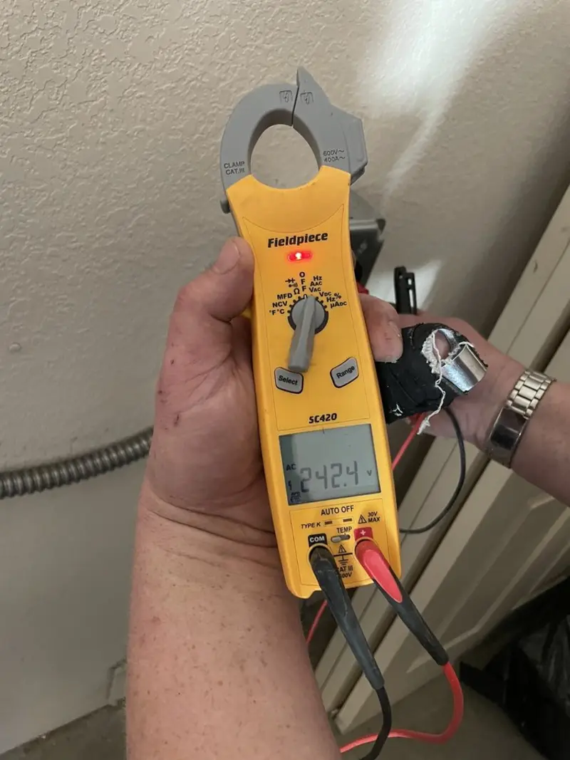 Voltage testing with clamp meter during Generator Installation in St. Joseph